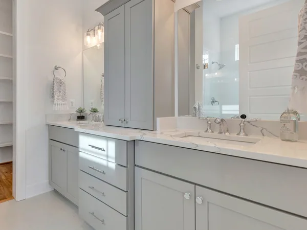 Gray bathroom cabinetry from Aspect Cabinetry, a Champion Cabinets supplier