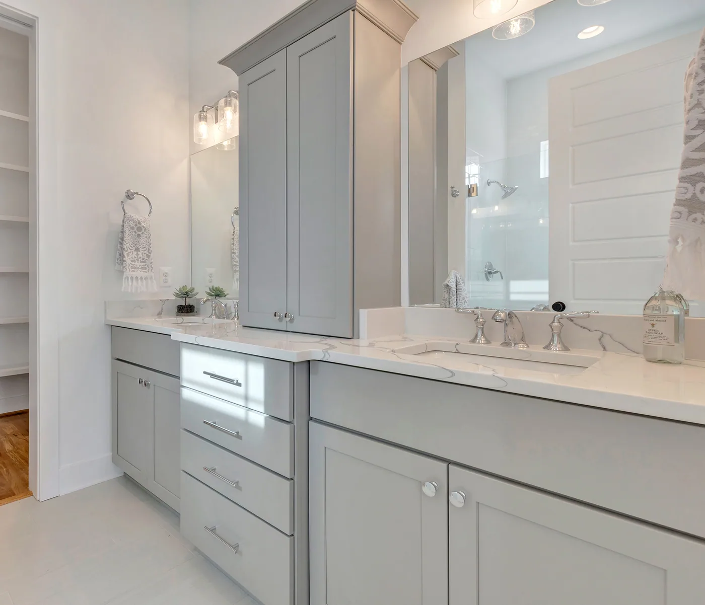 Gray bathroom cabinetry from Aspect Cabinetry, a Champion Cabinets supplier
