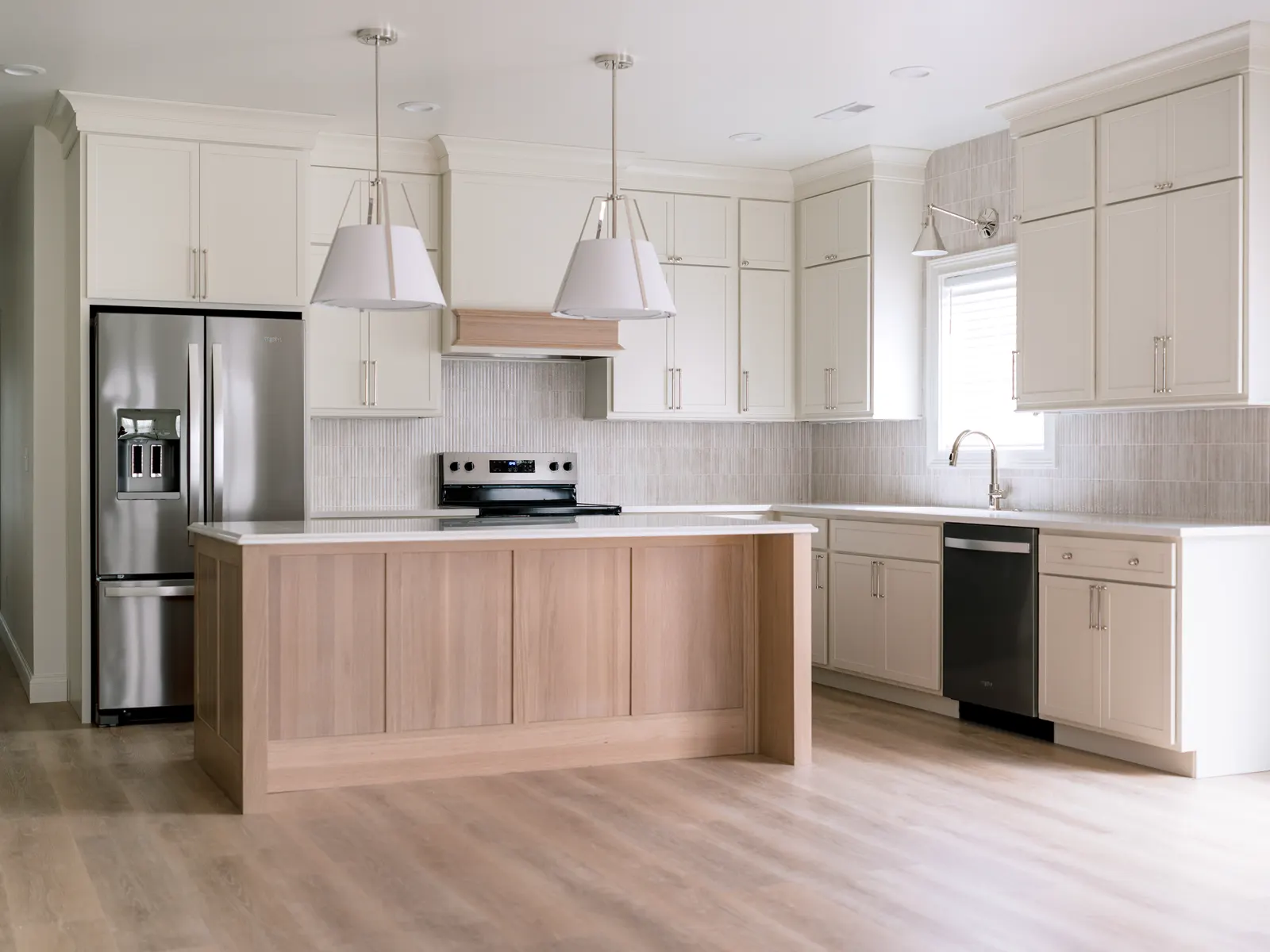 Warm white oak island with a soft cream perimeter